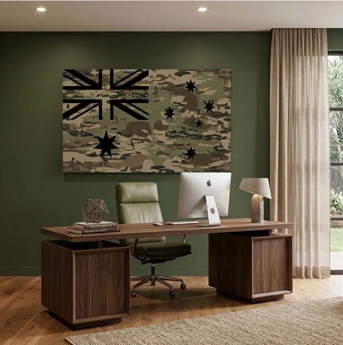 Camouflage Australian flag SEG print displayed above a walnut desk in a home office